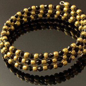 'Gilded Midnight' glass beaded coil bracelet